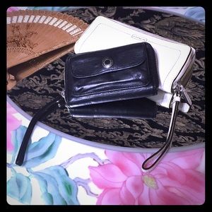 1 White Coach clutch & 1 black Coach wallet